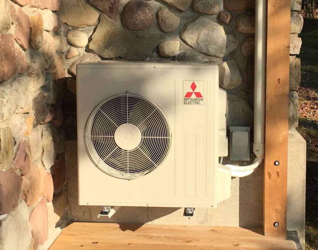 A picture of the outdoor unit in an air source heat pump