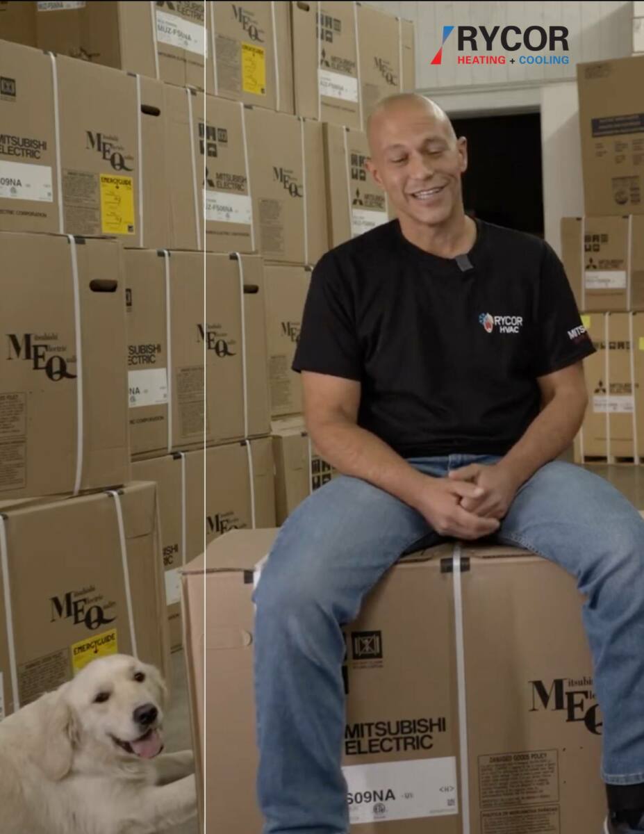 Representative of Rycor in a warehouse with a dog